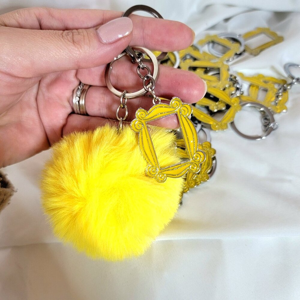 "Friends TV Show" 2 Piece Yellow Peephole Frame Keychain & Pom-Pom
